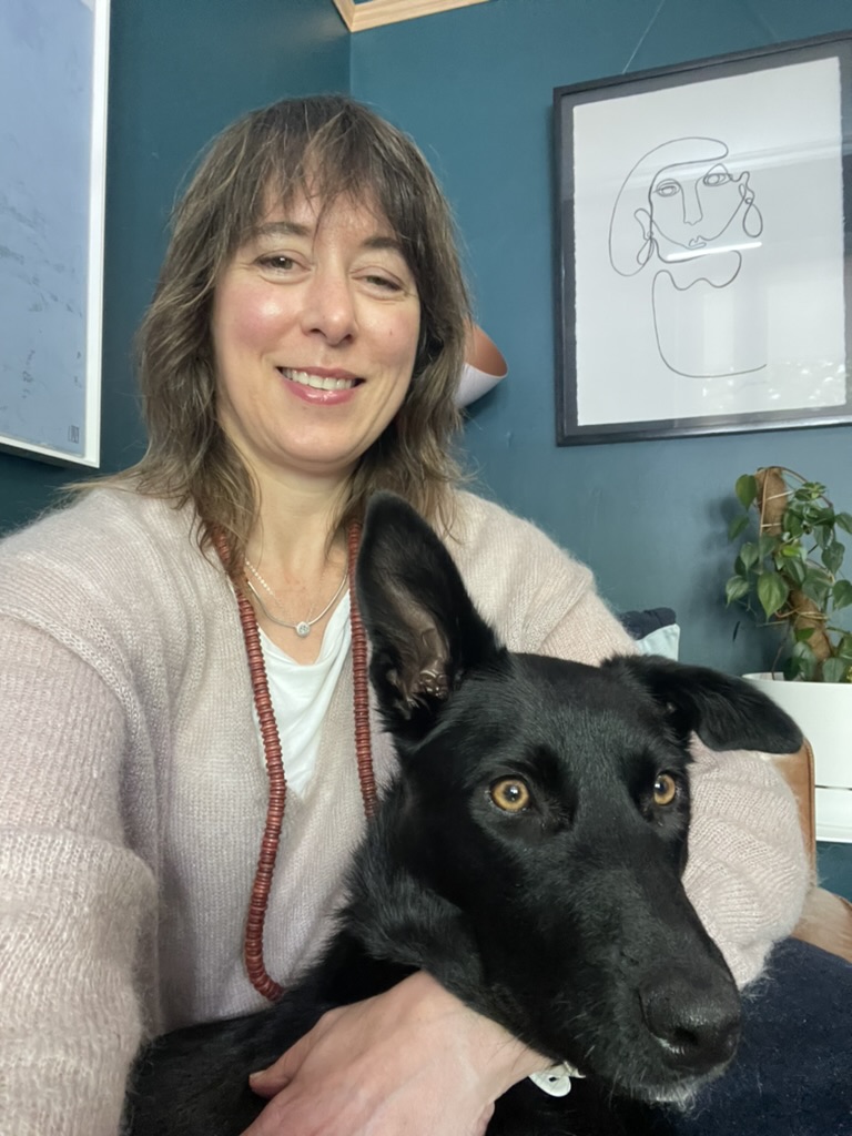 Nonie Carr, psychologist and Bindi (black kelpie puppy)