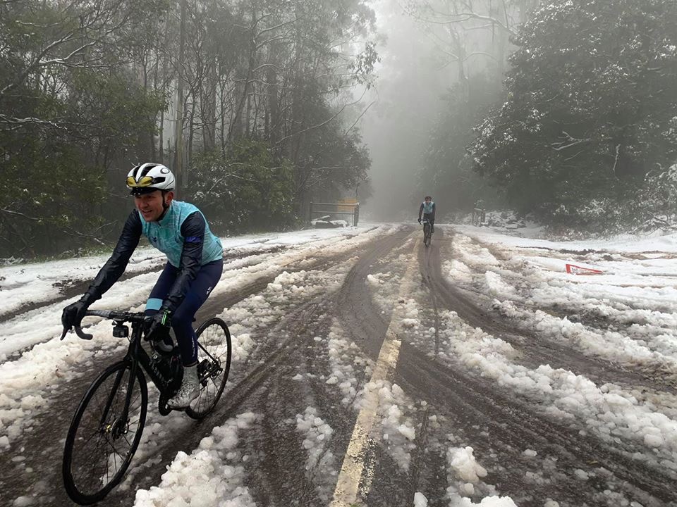Cyclists riding in difficult road conditions, adjusting to the environment under pressure